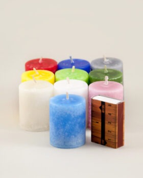 Coloured through marble textured antique candles in various colours. Handmade by Võhma Valgusevabrik