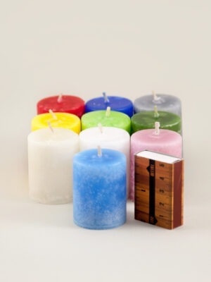 Coloured through marble textured antique candles in various colours. Handmade by Võhma Valgusevabrik