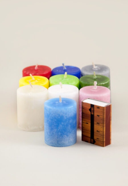 Coloured through marble textured antique candles in various colours. Handmade by Võhma Valgusevabrik