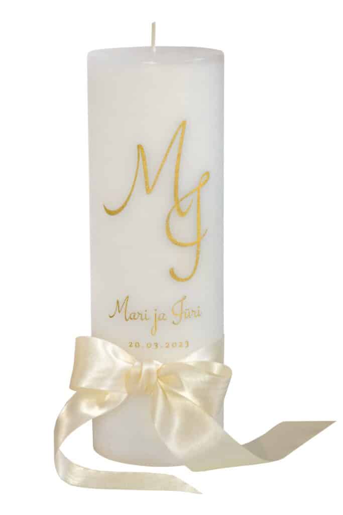Wedding candle with initials and ribbon