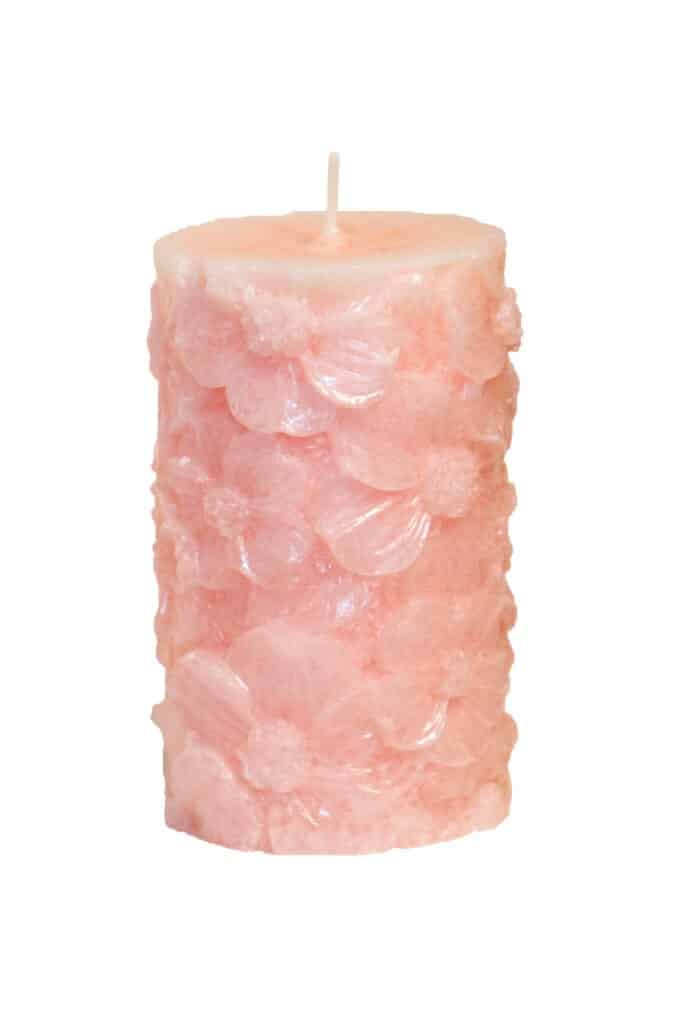 Scented candle with floral pattern