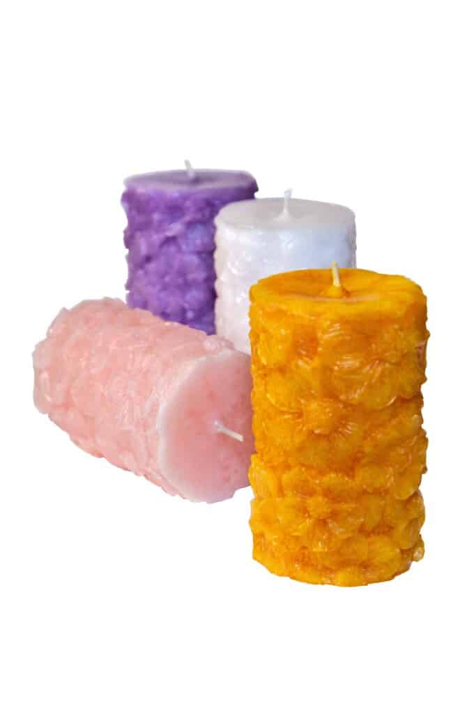 Scented candle with floral pattern